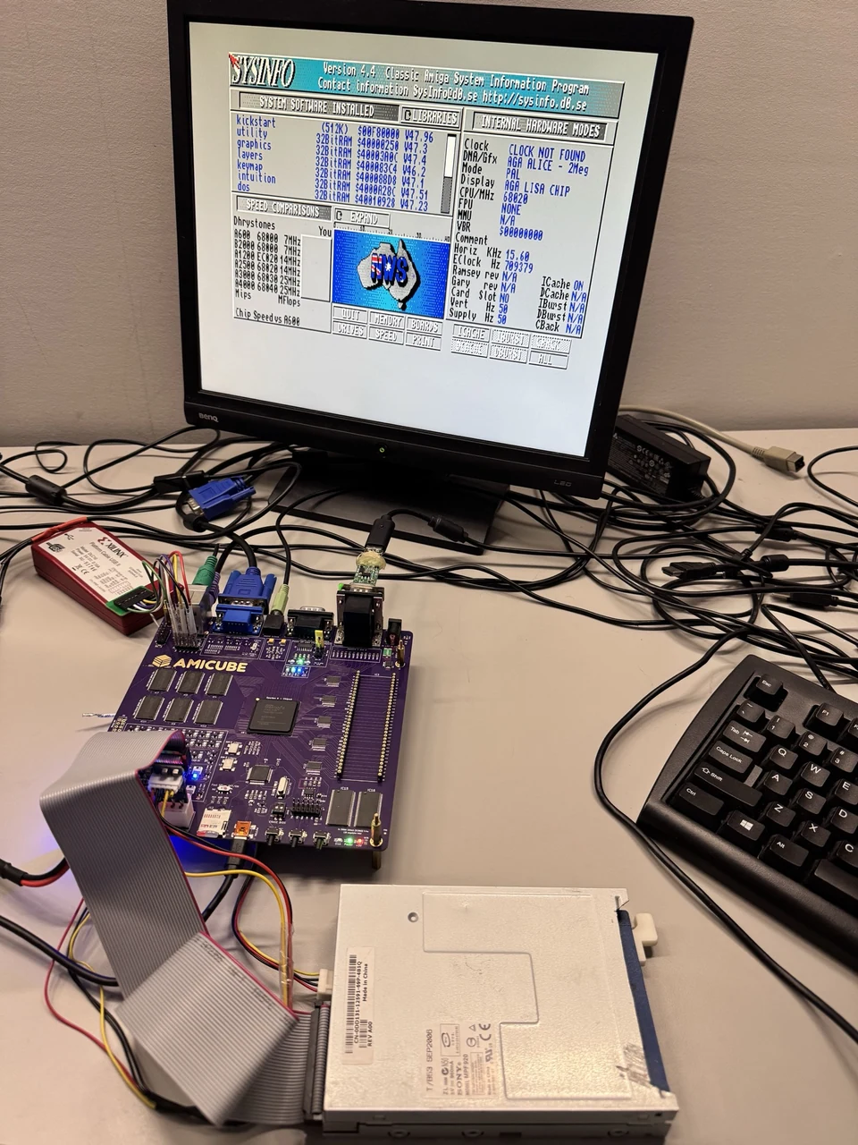 AmiCube motherboard and display running SysInfo during early real-floppy controller integration